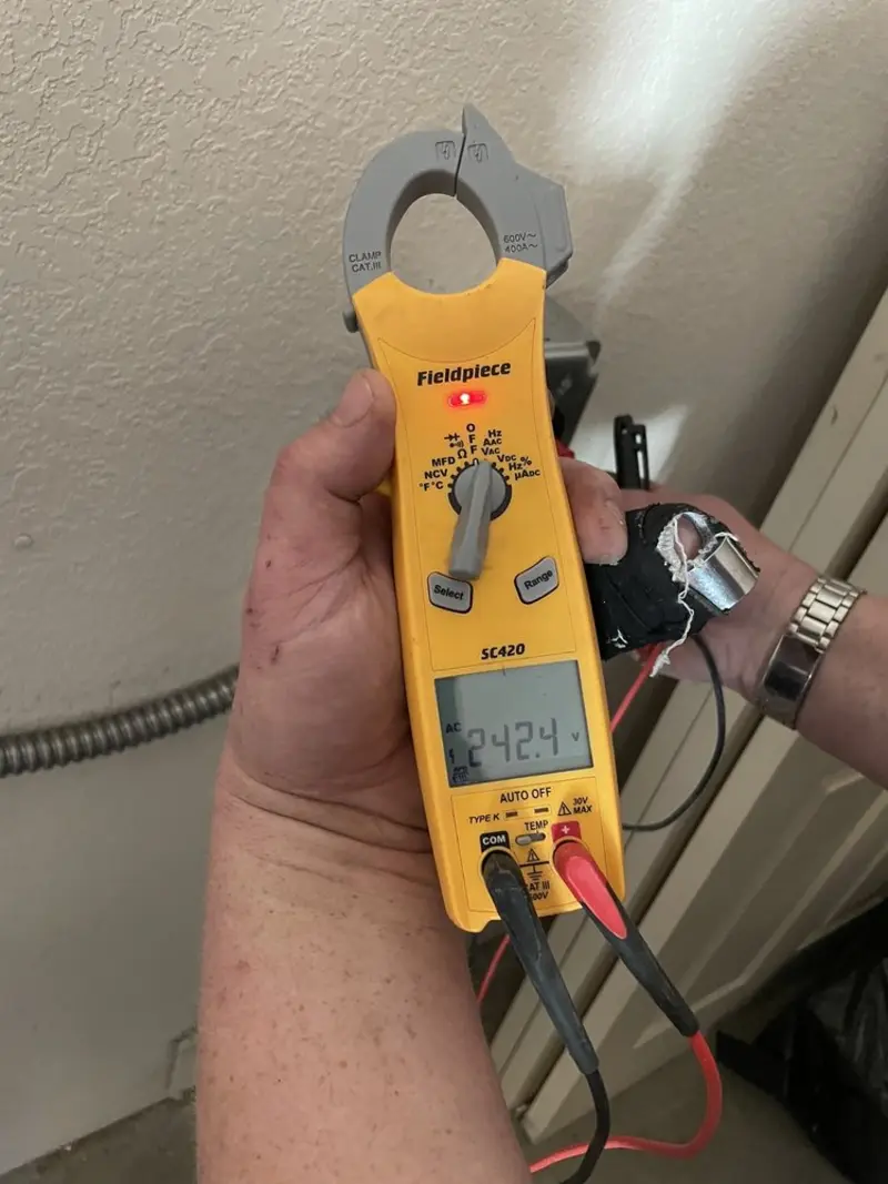 Voltage testing with clamp meter during Generator Installation in Marysville